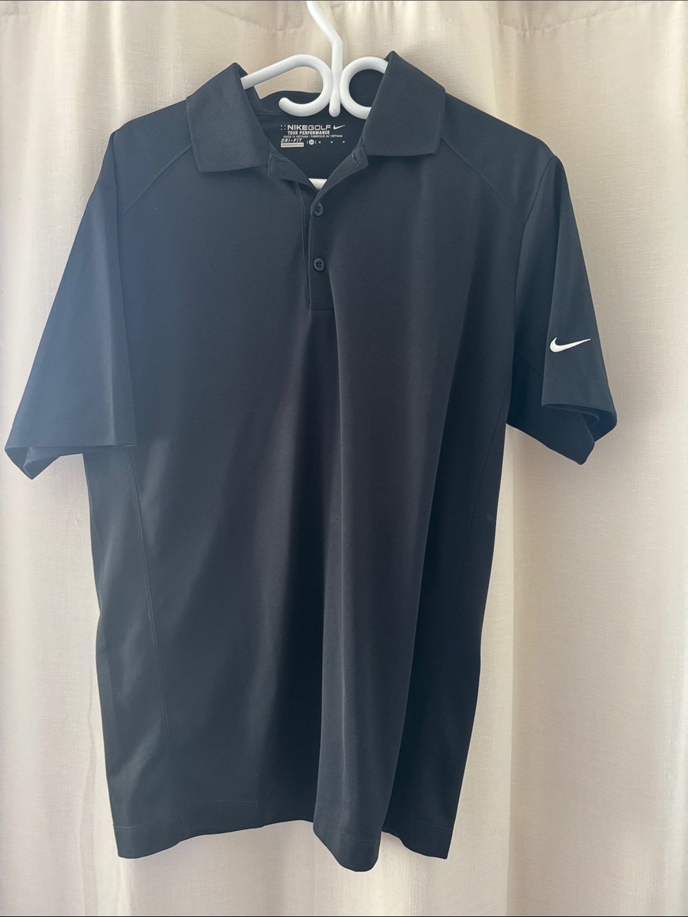 Nike Men’s Black Polo with White Swoosh